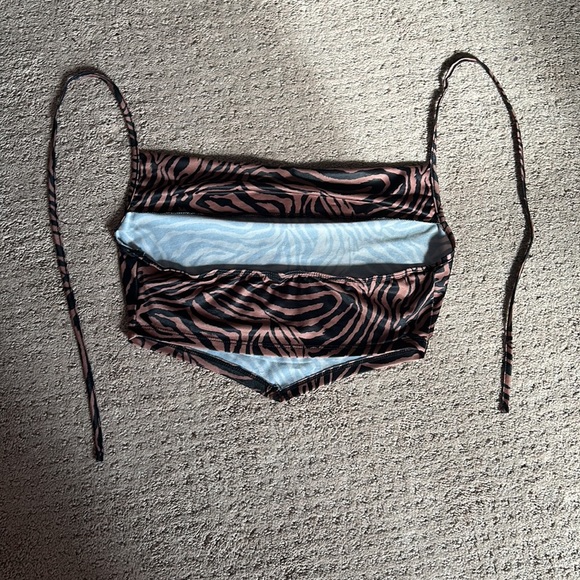 A crop top from SHEIN. Never been worn fabric is good.Zebra striped cowl shirt. - Picture 3 of 6